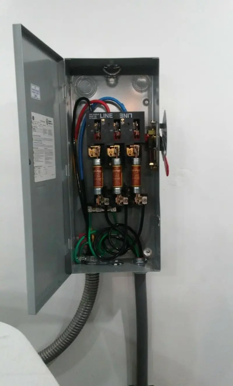 Three-phase disconnect switch installed for Smoke Detector Installation in Wilkins